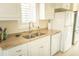 Kitchen sink with granite countertop and stainless steel appliances at 10 Toms Turnaround Cir, Edisto Island, SC 29438