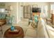 Living room with stainless steel refrigerator and TV at 10 Toms Turnaround Cir, Edisto Island, SC 29438