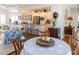 Bright living space features coastal decor, dining table, and access to a modern kitchen with stainless appliances at 10 Toms Turnaround Cir, Edisto Island, SC 29438