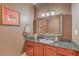 Bathroom with granite countertop, traditional vanity and decorative wall art at 1012 Denali Ct, Summerville, SC 29483
