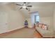 Bedroom with a ceiling fan, wood floors, neutral walls, and a chaise lounge at 1012 Denali Ct, Summerville, SC 29483