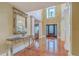 Grand foyer with soaring ceilings, hardwood floors, elegant columns, and a beautifully designed front door with lots of natural light at 1012 Denali Ct, Summerville, SC 29483