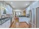 Open concept kitchen with stainless appliances and access to the dining room at 1012 Denali Ct, Summerville, SC 29483