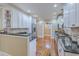 Bright kitchen features granite counters, stainless appliances and hardwood floors at 1012 Denali Ct, Summerville, SC 29483