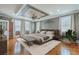 Spacious main bedroom with tray ceiling, hardwood floors, and lots of natural light at 1012 Denali Ct, Summerville, SC 29483