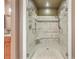 Walk-in shower with a built-in bench, glass doors, tile surround, and a shower head at 1012 Denali Ct, Summerville, SC 29483