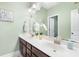 Well-lit bathroom featuring a double sink vanity, decorative mirror, and stylish finishes at 106 Terrapin Cir, Summerville, SC 29483