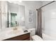 Clean bathroom with a sink, mirror, toilet, and shower with shower curtain at 106 Terrapin Cir, Summerville, SC 29483