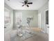 Bright bedroom with natural light, ceiling fan, and desk with chair at 106 Terrapin Cir, Summerville, SC 29483