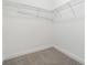 Walk-in closet featuring wire shelving and neutral carpet at 106 Terrapin Cir, Summerville, SC 29483