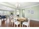 Open-concept living area features a dining area with a wood table and views into the living room at 106 Terrapin Cir, Summerville, SC 29483