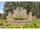 Beautiful brick entrance to Lindera Preserve community with decorative landscaping and elegant signage at 106 Terrapin Cir, Summerville, SC 29483