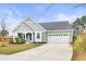 Beautiful single-Gathering home with a well-kept lawn, two-car garage, and traditional design elements at 106 Terrapin Cir, Summerville, SC 29483