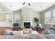 Charming living room with a fireplace, two chairs, and a ceiling fan offering a relaxing space at 106 Terrapin Cir, Summerville, SC 29483