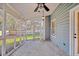 Relaxing screened porch with ceiling fan and open view to the backyard at 1060 Oakcrest Drive, Charleston, SC 29412