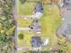 Aerial view of waterfront homes with long driveways, spacious yards, and private docks on the lake at 1106 Mccrae Dr, Moncks Corner, SC 29461