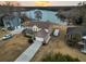 Aerial view of the beautiful home with a long driveway and lake access at 1106 Mccrae Dr, Moncks Corner, SC 29461