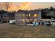 Brick home featuring a spacious backyard with a patio, grill, shed, and ample room for outdoor activities at 1106 Mccrae Dr, Moncks Corner, SC 29461