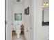 Cozy half-bathroom with stylish artwork and practical storage shelves at 1106 Mccrae Dr, Moncks Corner, SC 29461