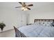 Comfortable bedroom with ceiling fan and double-door closet for ample storage at 1106 Mccrae Dr, Moncks Corner, SC 29461
