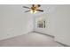 Bright bedroom with a large window and modern ceiling fan fixture at 1106 Mccrae Dr, Moncks Corner, SC 29461