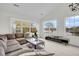 Comfortable living room with large windows and neutral carpet at 1106 Mccrae Dr, Moncks Corner, SC 29461