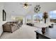 Spacious living room with vaulted ceiling, large windows and lake views at 1106 Mccrae Dr, Moncks Corner, SC 29461