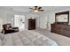 Bright main bedroom with walk-in closet, en-suite bathroom, and neutral carpet at 1106 Mccrae Dr, Moncks Corner, SC 29461