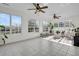 Bright sunroom with tile flooring, large windows, and comfortable seating area at 1106 Mccrae Dr, Moncks Corner, SC 29461