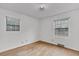 Bright bedroom featuring hardwood floors and dual windows at 120 Carol Dr, Goose Creek, SC 29445