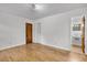 Bright bedroom with hardwood floors, a closet, and access to an adjacent bathroom at 120 Carol Dr, Goose Creek, SC 29445