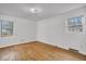 Spacious bedroom features hardwood floors and two windows at 120 Carol Dr, Goose Creek, SC 29445