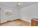 Sunlit bedroom with hardwood floors and natural light from the window at 120 Carol Dr, Goose Creek, SC 29445