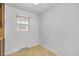 A cozy, brightly lit room features a window and an older vinyl floor at 120 Carol Dr, Goose Creek, SC 29445