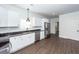 Contemporary kitchen with stainless steel appliances and white cabinets at 123 White Picket Ln, Summerville, SC 29483