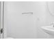 A clean half bath features a pedestal sink, large mirror, and sleek fixtures at 1241 Allusion Ln, Mount Pleasant, SC 29466