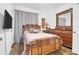 Cozy bedroom with wood floors, natural decor, and lots of light at 1241 Allusion Ln, Mount Pleasant, SC 29466