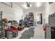 Spacious garage with storage shelves, tool chest, and access to the house at 1241 Allusion Ln, Mount Pleasant, SC 29466