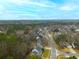 Beautiful aerial view of the neighborhood showcasing lush landscaping, and well-maintained homes at 129 Isherwood Dr, Goose Creek, SC 29445