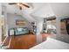 Upstairs bonus room with vaulted ceilings, hardwood floors and comfortable seating at 129 Isherwood Dr, Goose Creek, SC 29445