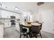 Modern kitchen with white cabinets, granite countertops, stainless steel appliances, and a central island at 129 Isherwood Dr, Goose Creek, SC 29445