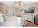 Another view of the main bedroom featuring wood floors, neutral decor and an ensuite at 129 Isherwood Dr, Goose Creek, SC 29445
