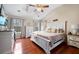 Spacious main bedroom with vaulted ceilings, wood floors, and large windows at 129 Isherwood Dr, Goose Creek, SC 29445