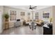 Bright sun room features light wood floors, recessed lighting and a modern ceiling fan at 129 Isherwood Dr, Goose Creek, SC 29445