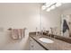 Bathroom featuring granite countertops, a large mirror, and modern fixtures at 133 Wentworth St, Charleston, SC 29401