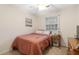 Bedroom with a ceiling fan and large windows, offering natural light at 133 Wentworth St, Charleston, SC 29401