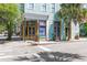 Corner retail space with large display windows, wood trim, and inviting curb appeal at 133 Wentworth St, Charleston, SC 29401