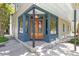 Charming corner shop with a quaint entrance, large windows, and a welcoming atmosphere at 133 Wentworth St, Charleston, SC 29401
