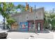 Unique building with vintage signage, large windows, and sidewalk access at 133 Wentworth St, Charleston, SC 29401