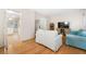 Cozy living room featuring hardwood floors, a TV, and comfortable seating, providing a perfect space for leisure and relaxation at 133 Wentworth St, Charleston, SC 29401